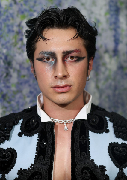 Hudson Williams wearing mismatched eye shadow at the Met Gala